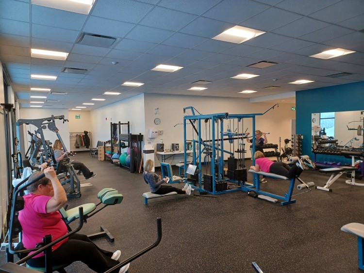 SCHIKOWSKI FAMILY FARMS FITNESS CENTRE MEMBERS WORKINGOUT IN ELBOW, SK